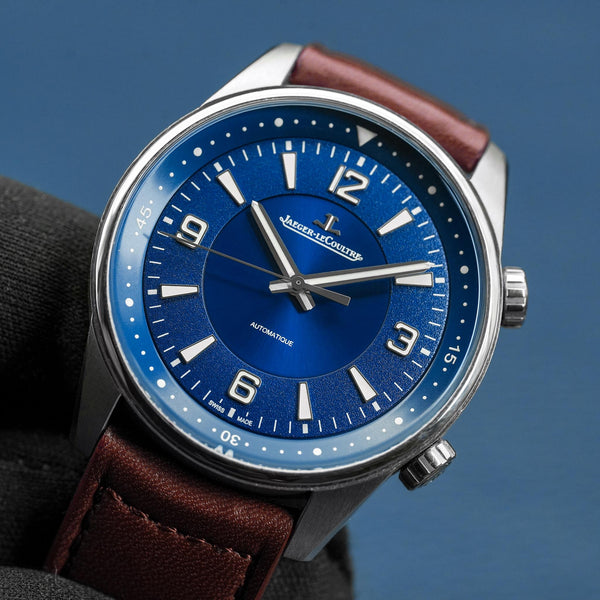 Front view of Jaeger-LeCoultre Polaris Q9008480 Blue Dial in gloved hand