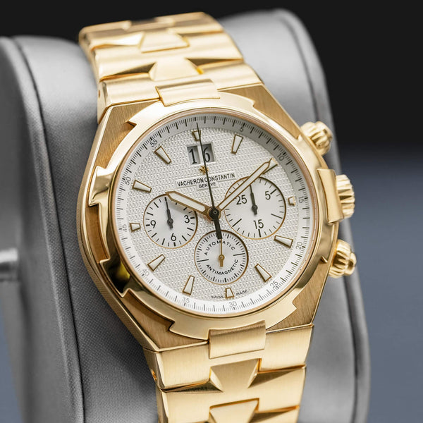 Close-up angled view of Vacheron Constantin Overseas 49150 Yellow Gold White Dial