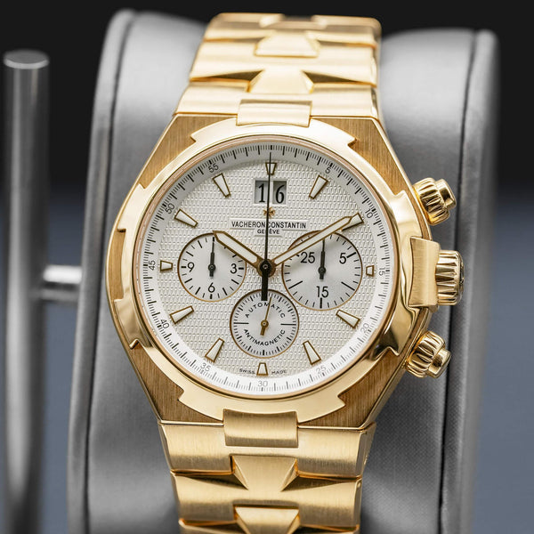 Slight angled view showing crown on Vacheron Constantin Overseas 49150 Yellow Gold White Dial