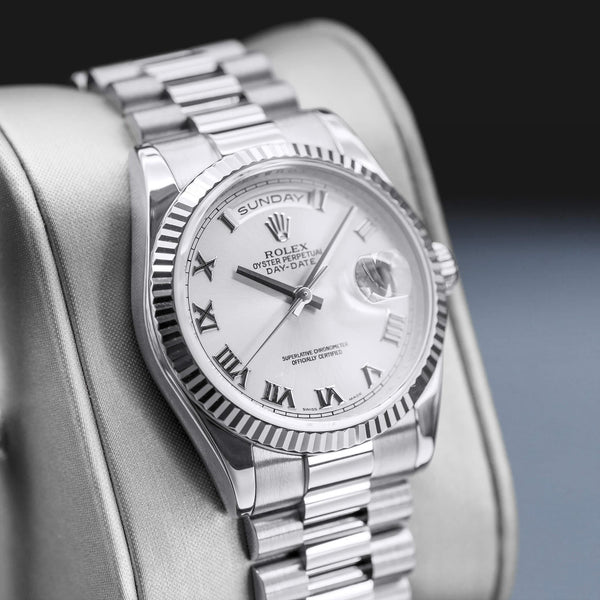 Angled view with reflection of Rolex Day-Date 118239 Silver Dial