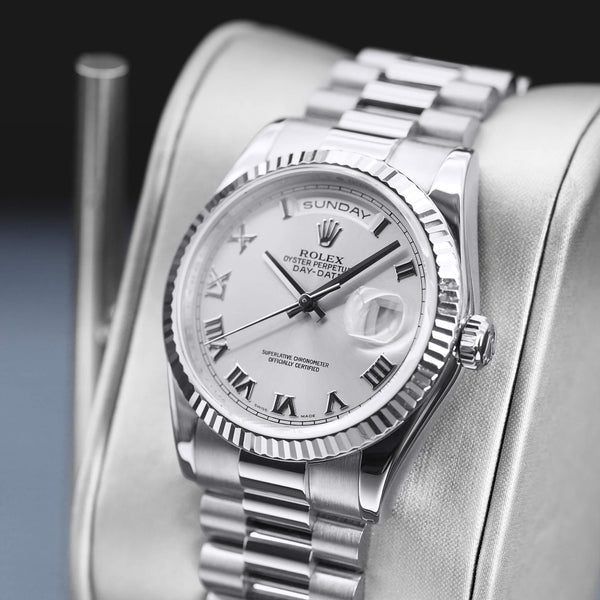 Angled opposing view with reflection of Rolex Day-Date 118239 Silver Dial