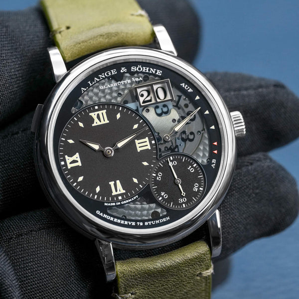 Front view of A. Lange & Sohne Grand Lange 1 Lumen Platinum 117.035 in gloved hand