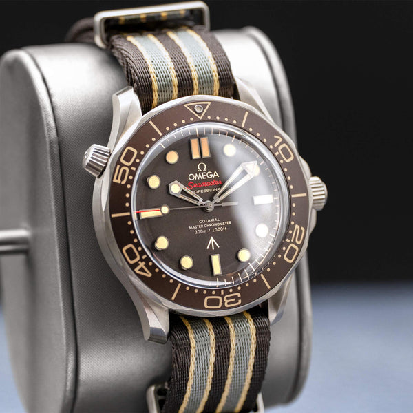 Angled view with reflection of Omega Seamaster Diver 300M No Time To Die 007 Edition
