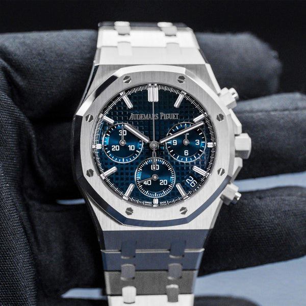 Front view of Audemars Piguet Royal Oak Chronograph 26240ST Blue Dial in gloved hand