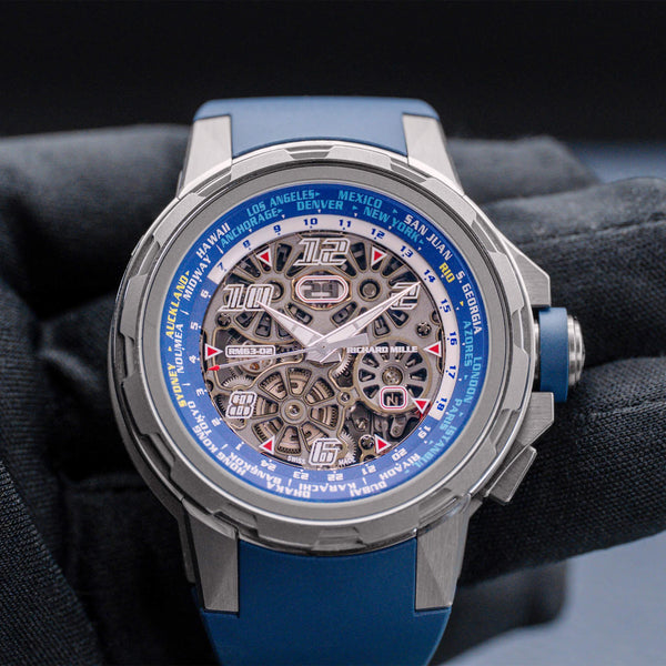 Front view of Richard Mille World Timer RM63-02 in gloved hand