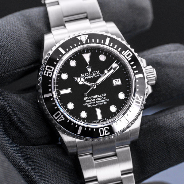Front view of Rolex Sea-Dweller SD4K 116600 in gloved hand
