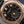Angled macro view of Patek Philippe Annual Calendar 5205R Rose Gold 