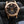 Front view of Patek Philippe Annual Calendar 5205R Rose Gold in gloved hand