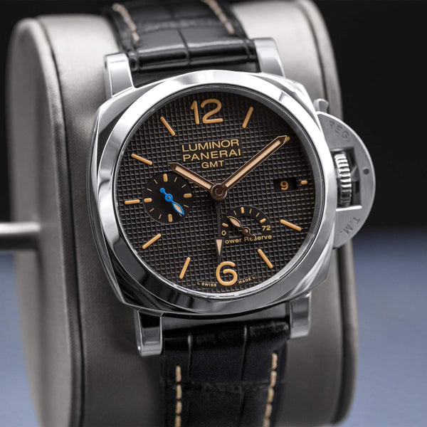 Close-up angled view of Panerai Luminor 1950 3 Days GMT PAM01537 Black Dial 