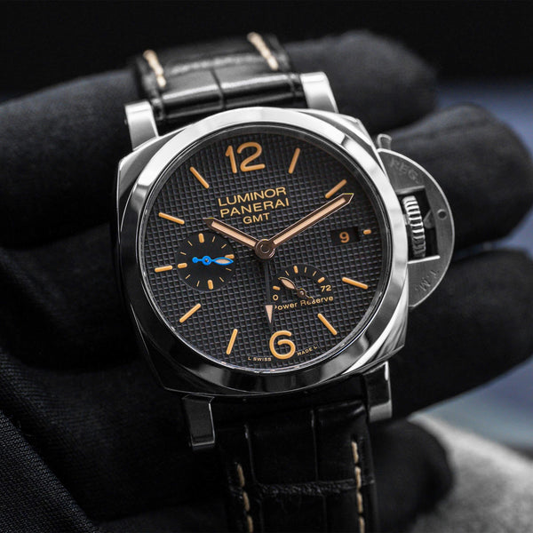 Front view of Panerai Luminor 1950 3 Days GMT PAM01537 Black Dial in gloved hand
