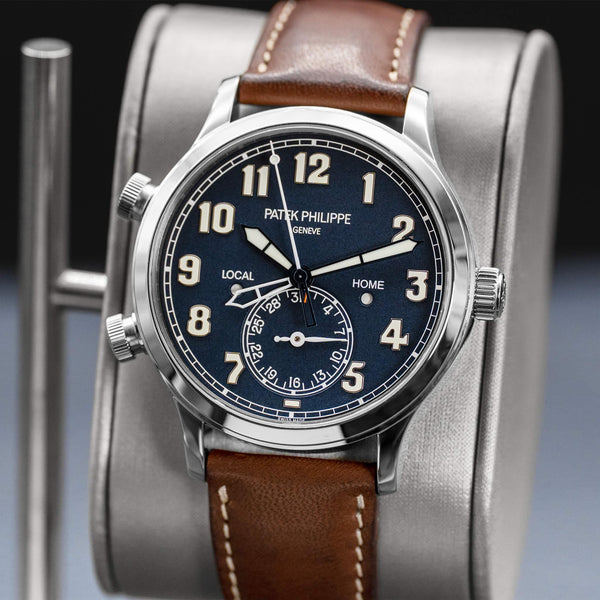 Close-up opposing view of Patek Philippe Calatrava Travel Time 5524G Blue Dial 