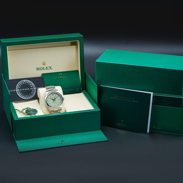 Rolex Oyster Perpetual 134300 Pistachio Dial 41mm Box & Papers
