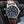 Front view of Patek Philippe Calatrava Travel Time 5524G Blue Dial in gloved hand