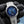 Front view of H.Moser & Cie Streamliner Blue Enamel 6500-1200 in gloved hand