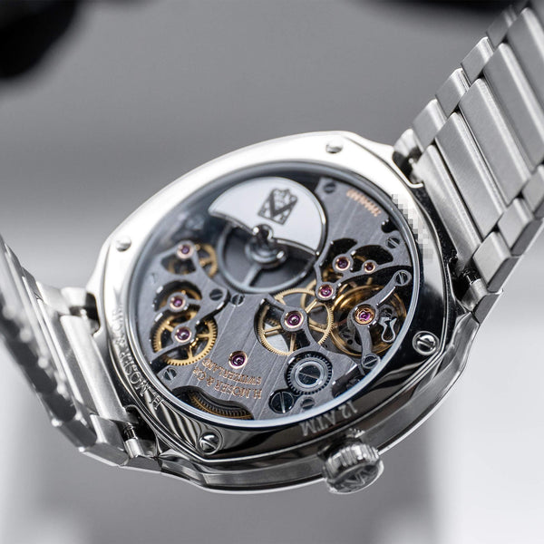 Caseback of H.Moser & Cie Streamliner Blue Enamel 6500-1200 showing movement