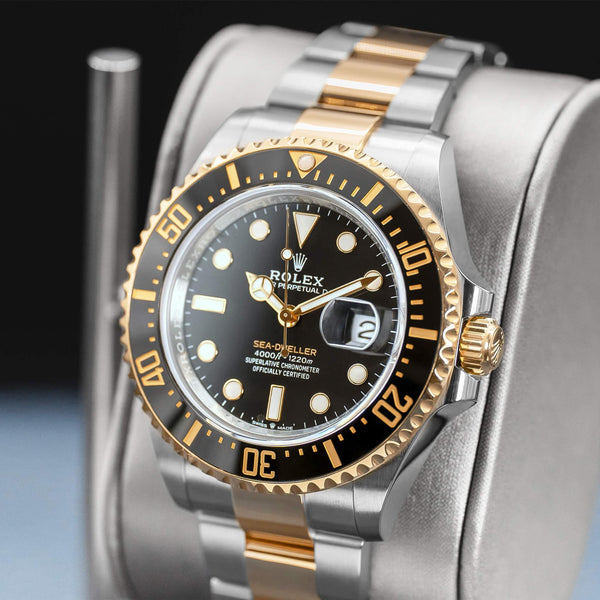 Angled opposing view with reflection of Rolex Sea-Dweller Two Tone 126603