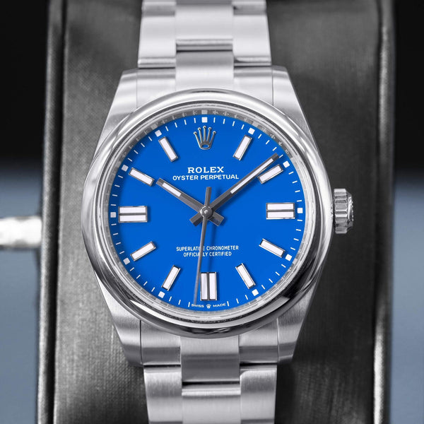Rolex Oyster Perpetual 134300 Blue Dial 40mm Mint Box & Papers