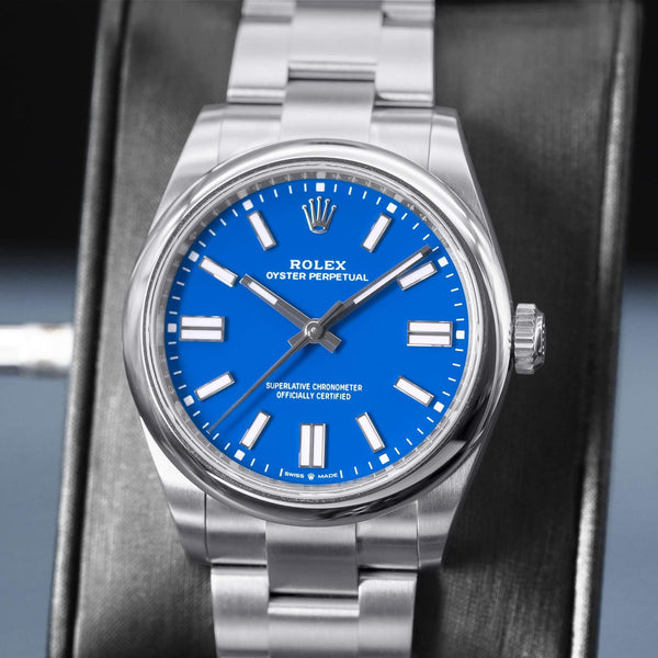 Rolex Oyster Perpetual 134300 Blue Dial 40mm Mint Box & Papers