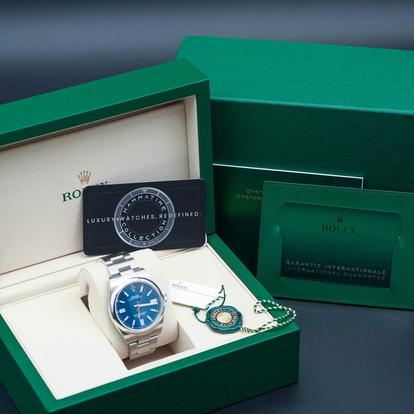 Rolex Oyster Perpetual 134300 Blue Dial 40mm Mint Box & Papers